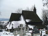 Pohľad na kostol v zime Drevený kostol v Tvrdošíne/Dreveny kostol v Tvrdosine
